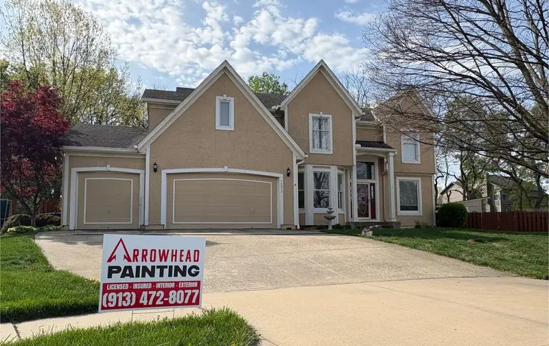 Before: Two-story: tan to cool gray with white trim