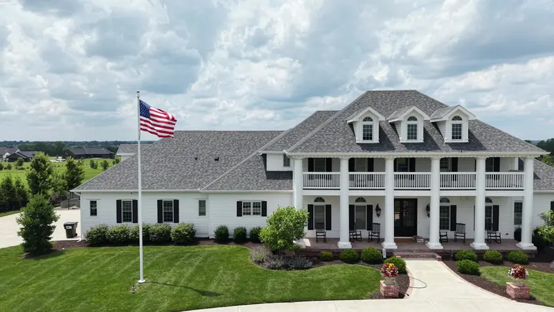 Large white Kansas City home painted by Arrowhead Painting
