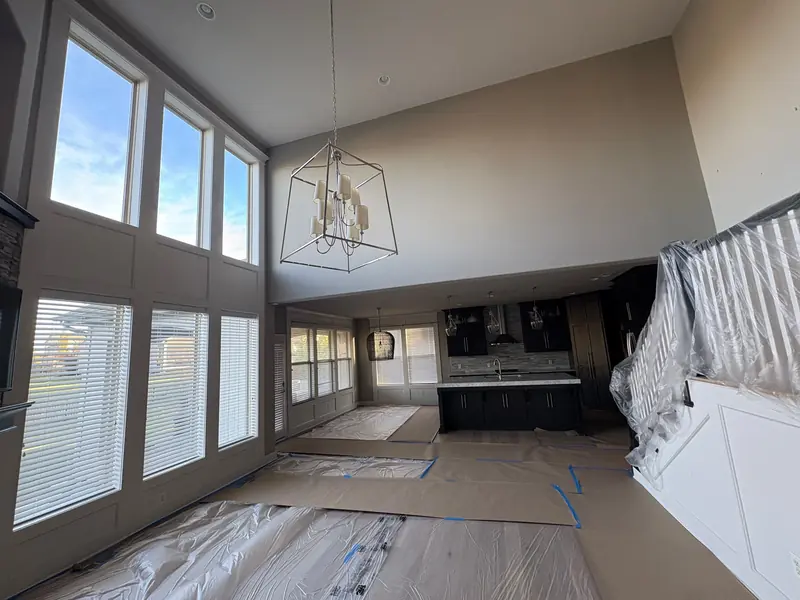 Great room floors and railing fully protected before painting